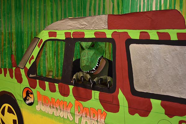 a person in a dinosaur costume