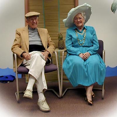 a man and a woman sitting in chairs